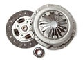 Set of replacement automotive clutch isolated on white background. Disc and clutch basket with release bearing.