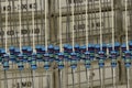 A set of resistors after dismantling electronic components next to the industrial packaging of new resistors