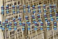 A set of resistors after dismantling electronic components next to the industrial packaging of new resistors