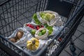 Set of reusable and zero waste cotton shopping bags for food in cart