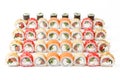 set of rolls Philadelphia in sesame Roll Laguna with smoked salmon Cucumber poppies on a white background, studio shot 3