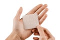 Set of round patches for acne in hands on white background. Acne patches for treatment of pimple and rosacea close-up