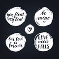 Set of round textured badges with modern calligraphy love quotes on the blackboard.