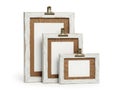 Set of rustic whitewashed wooden picture frames in varying sizes Royalty Free Stock Photo