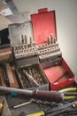 A set of rusty drill bits in a metal rusty box Royalty Free Stock Photo