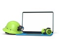 Set of safety helmets or hard caps, respirator and laptop on white background