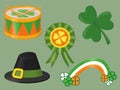 a set for saint patricks day includes holiday drum, three-leafed clover, black hat, rainbow and badge