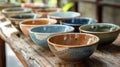 A set of salad bowls each with a different glaze color making them both practical and visually appealing.