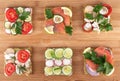 Set of sandwiches on a wooden background Royalty Free Stock Photo