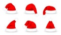 Set of Santa Claus hats. Realistic red Santa Claus caps on white background. Cute Christmas Santa hat Royalty Free Stock Photo