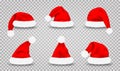 Set of Santa Claus hats. Realistic red Santa Claus`s caps isolated on transparent background. Christmas Santa`s hats Royalty Free Stock Photo