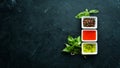 Set sauces and spices. On a wooden background. Top view. Royalty Free Stock Photo