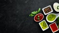 Set sauces and spices. On a wooden background. Top view. Royalty Free Stock Photo