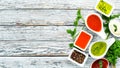 Set sauces and spices. On a wooden background. Royalty Free Stock Photo