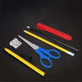 Set of school or office desk items on black board Royalty Free Stock Photo