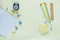 Set of school stationery back to school: pencils, clock, notepad, ruler on yellow background. education, lesson Royalty Free Stock Photo