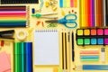 Set of school stationery and supplies on yellow background Royalty Free Stock Photo