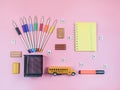 Set of school supplies on pink. Royalty Free Stock Photo