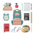 A set of school supplies, stationery, a pencil case with pencils,an apple, a notebook, a pen, an alarm clock, a school Royalty Free Stock Photo