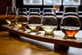 Scotch whisky, tasting glasses with variety of single malts or blended whiskey spirits on distillery tour in Scotland