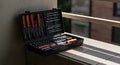 Set of Screwdriver Tools in Black Case on Balcony with Natural Light Royalty Free Stock Photo