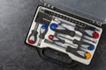 Set of screwdrivers inside toolbox, top view. Set mechanical tools in box