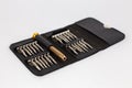 a set of screwdrivers in a leather case on a white background Royalty Free Stock Photo