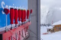 A set of screwdrivers with red holders and a set on a blue and red background with the inscription Service Station Royalty Free Stock Photo