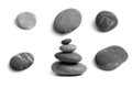 Set of sea pebbles. Single and balancing stones. Smooth gray and black stone isolated on white Royalty Free Stock Photo