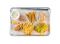 Set of seafood grilled steak tuna, white fish, salmon, fried gobies with salad of carrot, parsnip, lettuce, french fries