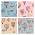 Set of seamless pattern with balloons in pastel colors. Many differently colored striped air balloons flying in the clouded