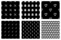 Set of seamless vector patterns. Black and white geometrical endless backgrounds with hand drawn geometric shapes, triangles, circ Royalty Free Stock Photo