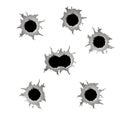 Set of seven bullet holes. Royalty Free Stock Photo