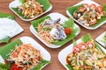 Set of several papaya salad and spicy salad on the table. Thai style food concept Royalty Free Stock Photo