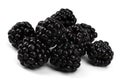 Side view on a heap of black berries on white background