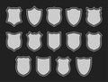 Set of shields isolated on dark grey Royalty Free Stock Photo