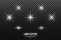 Set of shining stars. Light effects isolated on a black transparent background. White glares and flare. Vector illustration Royalty Free Stock Photo