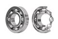 Set of Shiny Chrome Steel Ball Bearings with One Cut Outed Where Visible the Inner Parts. 3d Rendering Royalty Free Stock Photo