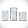 Set of shiny metallic foil packages in various sizes Royalty Free Stock Photo