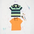 Set of shirts in different colors and colorful prints for children Royalty Free Stock Photo