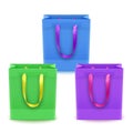 Set of shopping bags from plastic or paper with handles on white background, shopping bags of blue, green and purple colors, Royalty Free Stock Photo