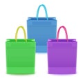 Set of shopping bags from plastic or paper with handles on white background, shopping bags of blue, green and purple colors, Royalty Free Stock Photo