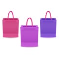 Set of shopping bags from plastic or paper with handles on white background, shopping bags of blue, pink and purple colors, vector Royalty Free Stock Photo