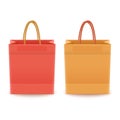 Set of shopping bags from plastic or paper with handles on white background, shopping bags of yellow and orange colors, vector Royalty Free Stock Photo