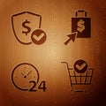 Set Shopping cart with check mark, Shield with dollar, Clock 24 hours and Shoping bag and dollar on wooden background Royalty Free Stock Photo