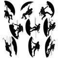 Set silhouettes of alpinists (climbers). Royalty Free Stock Photo