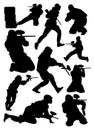 Silhouettes of paintball players vector