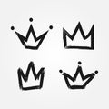 Set of silhouettes of crowns. Painted by hand with a rough brush.