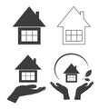 A set of silhouettes of house icons and hands holding the house. Isolated on a white background. Vector illustration