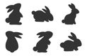 Set of silhouettes of rabbits. Collection of rabbits in various poses. Easter bunny. Vector illustration on a white background Royalty Free Stock Photo